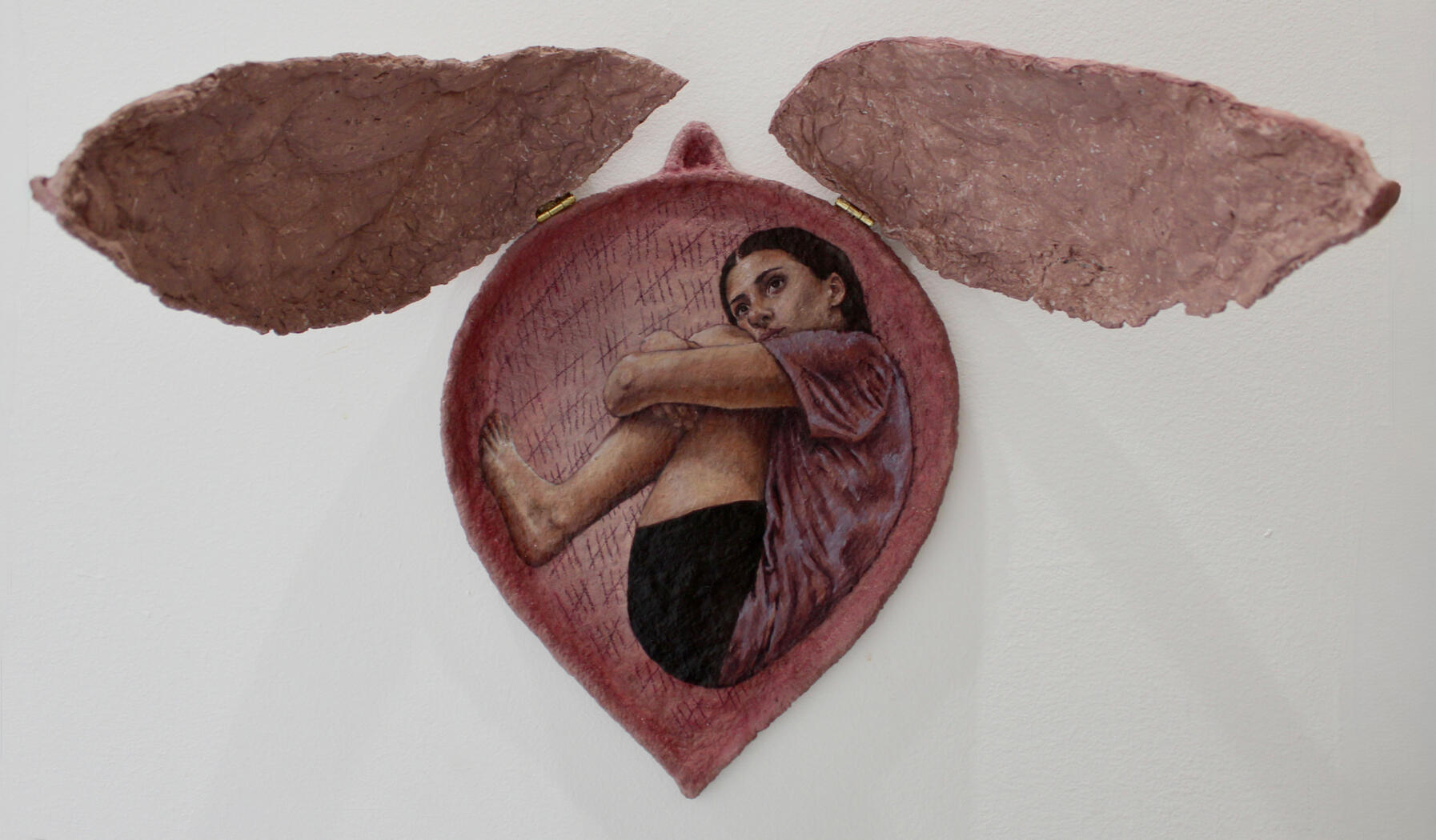 Waiting on Germination (open); Oil paint and colored pencil on recycled paper structure; 17” x 13” x 3.5”; 2024